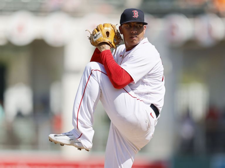 Red Sox RHP Bryan Mata throws a pitch during spring training 2023.