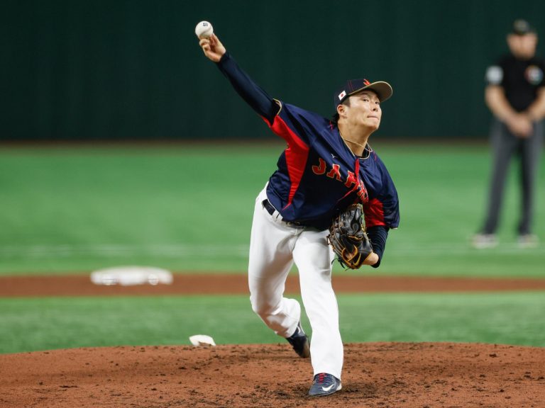 Yoshinobu Yamamoto pitches in the World Baseball Classic.